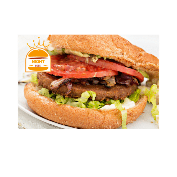 Veggie burger with plant-based patty, lettuce, tomato, and sauce in a toasted bun